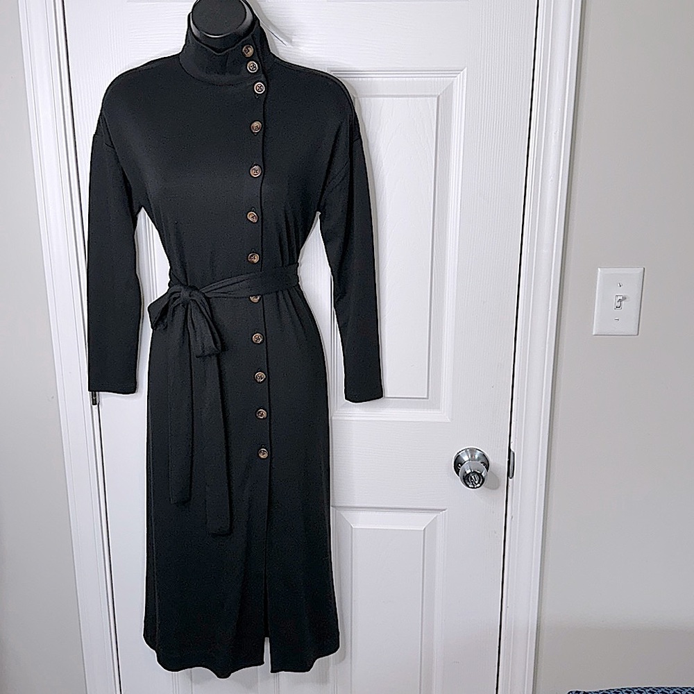 Black never look so good in this tight fitted dress will make a BOSS statement!